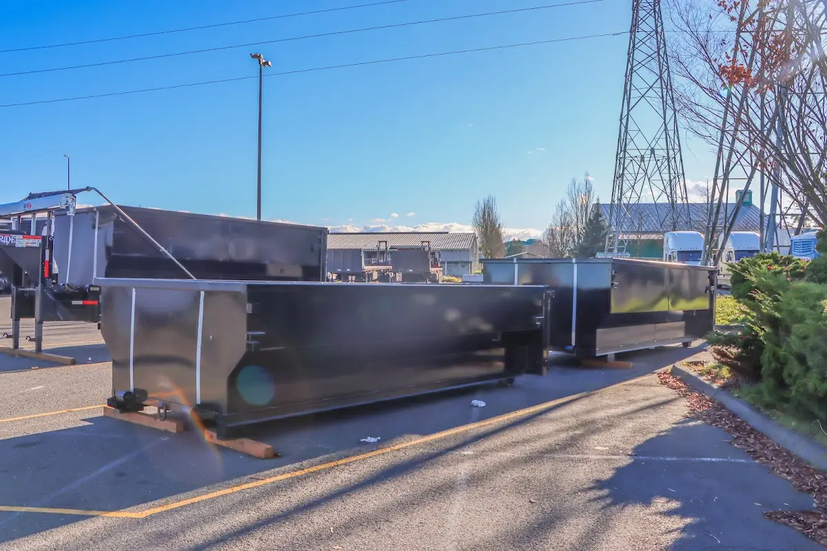Roll-off dumpster ready for waste disposal at job site for Demolition Dumpster Rental in Merchantville